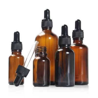 China Wholesale 5-100ml Brown Empty Cosmetic Essential Oil Serum Dropper Bottle Environmental Friendly Glass Bottle for sale