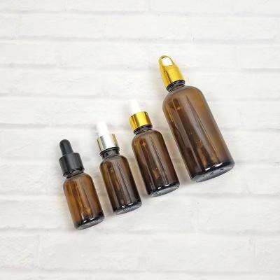 China Wholesale Environmental Friendly 5ml 10ml 20ml 30ml 50ml Amber Pharmaceutical Dropper Cosmetics Glass bottles Mini Dropper For Essential Oils for sale