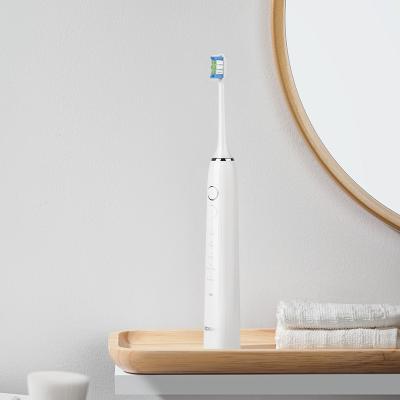 China OEM High Quality Battery Operated Sonic With Wireless Charger Rechargeable Electric Toothbrush for sale