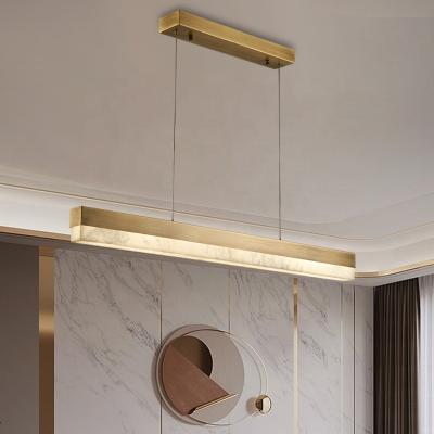 China Chinese Style Dining Room Simple Modern Copper Chandelier Strip Study Tea Room One Led Marble Pendant Lamp for sale