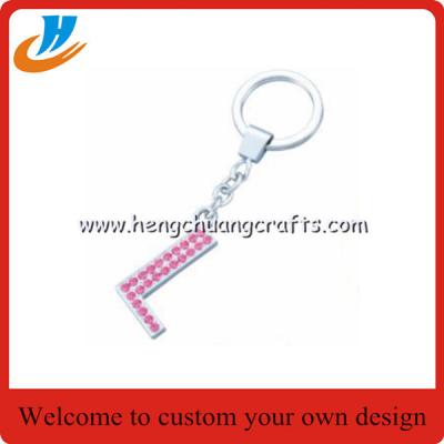 China Custom personalised cool keyrings/keychain with name with your own design for sale