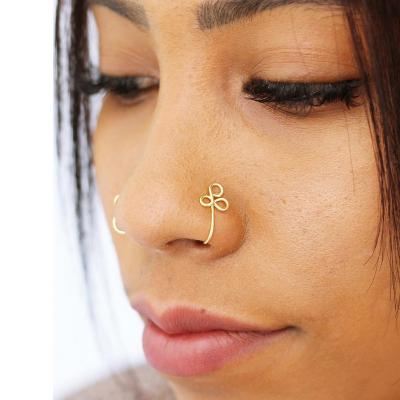 China FASHIONABLE Simple Gold Geometric Twisted Stainless Steel Nose Cuff Cut Nonporous Titanium Jewelry Piercing Fake Nose Ring for sale