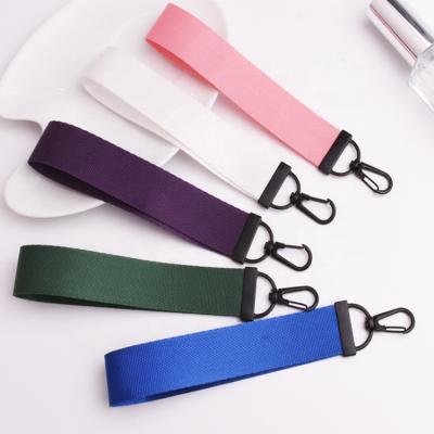 China Wholesale Colorful Woven Custom Metal Logo Keychain With Metal-hook Wrist Lanyard for sale