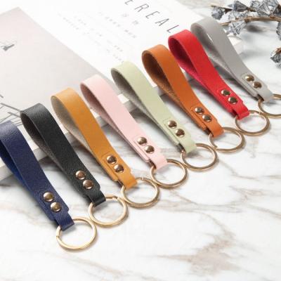 China Promotion Gift Wholesale Custom Embossed Colorful Logo PU Leather Key Chain Metal Strap Promotional Gift for sale