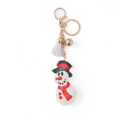 China TRENDY Fashion Jewelry Gold Plated White Paved Christmas Snowman Tassel Padded Keychain Accessories for sale