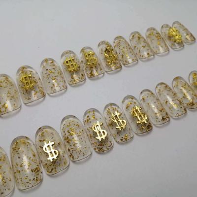 China New Design Designer Removable Glossy Gold Fake Nails Cute Fake Nails With Decoration for sale