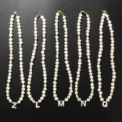 China Wholesale TRENDY Fashion Jewelry 18K Gold Plated 12 Alphabet Shell Letter Necklace Natural Fresh Water Beads Necklace For Women for sale