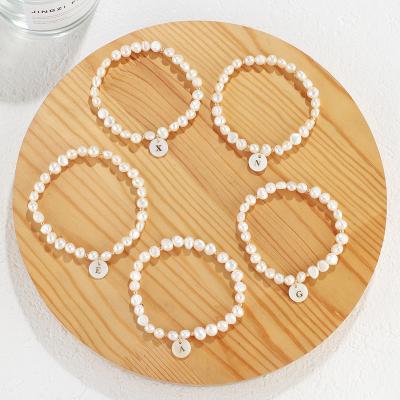 China Wholesale TRENDY Fashion Jewelry Gold Plated 12 Letter Bracelet Charms Freshwater Pearl Bead Bracelet For Women for sale