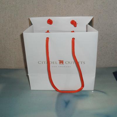 China Gift & Luxury Custom Clean Craft Logo Printed Retail Clothing Packaging Paper Bag Shopping Paper Bag For Clothes for sale