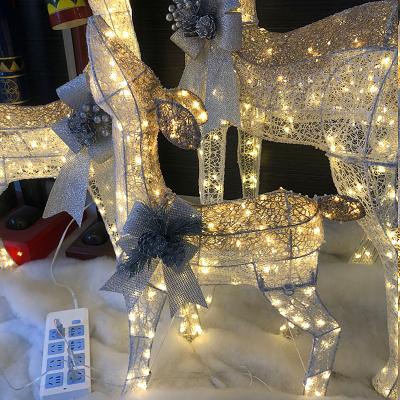 China Festival Decoration Christmas Elk Family Three Warm White Luminous Deer Tree Large Ornaments Outdoor Home Decoration Decoration Deer Ornaments for sale