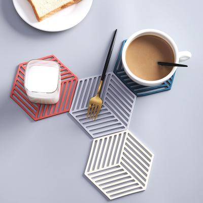 China Sustainable Wholesale Hexagon Silicone Placemat Non Slip Heat Resistant Coaster hot Pot Silicone Trivet Mat for sale