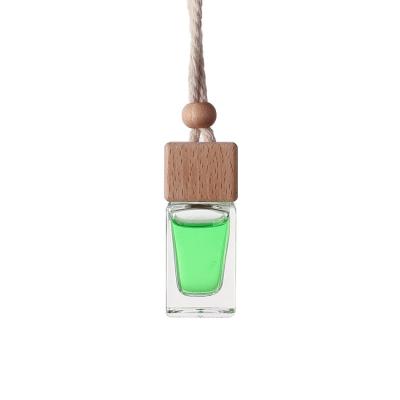 China Empty Car Perfume Bottle Cosmetic Hanging Glass Essential Oil Diffuser, Air Freshener for Aromatherapy Car for sale