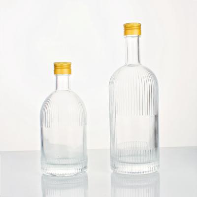 China Beverage High Grade Vertical Stripe 500ml Glass Bottle Wine Bottle Beverage Bottle Polymer Cover for sale