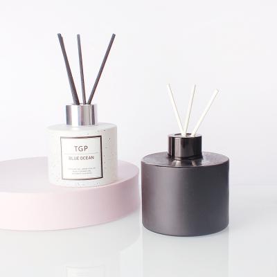 China Cosmetic Luxury Spray Painted 100ml 180ml Glass Black White Perfume Reed Diffuser Bottle for sale