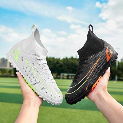 China Broken yuanyang children's boys and girls high nail PVC top nail football shoes students forming shoes factory for sale