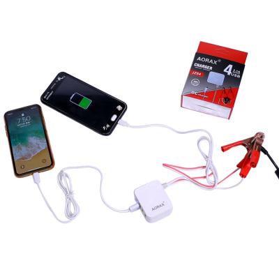 China 2022 Trending Mobile Phone Focuses 4 USB Clamp Charger 5V 2A Clip Charger Motorcycle Charger Accessory for sale