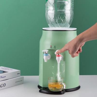 China Small Household Water Dispenser Hotel Mini Dormitory Student Desktop Office Refrigeration and Heating Hot Ice for sale