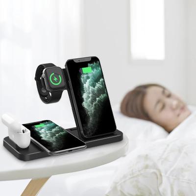 China Smart Watch Folding Four in One Wireless Charger Mobile Phone Bracket Magnetic Suction Fast Charging Multifunctional Charging Stand for sale