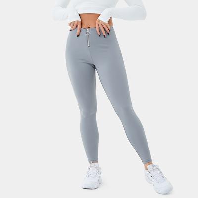 China OEM Logo Gym Workout Pants Women Mid Rise Plain Fit Plain Slim Breathable Zipper Full Length Fitness Yoga Gaiters for sale