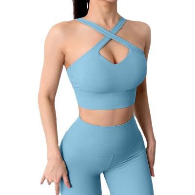 China Custom Unilateral Swept Seismic Breathable Bare Wear Yoga Cross Ties Beautiful Back Straps Invest Hip Lift Pants Solid Color Yoga Set for sale