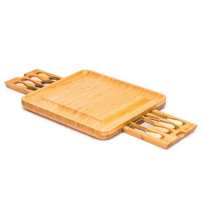 China Large Size Eco-Friendly Bamboo Cheese Cutting Board with 2 Sets of Carry Case and 4-Piece Stainless Steel Cutlery for sale