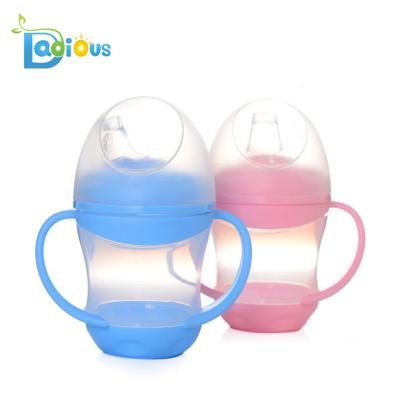 China Two-Handle BPA Free First Baby Feeding Bottle Self Sippy Cup Platypus Cup Baby Training Bottle for sale