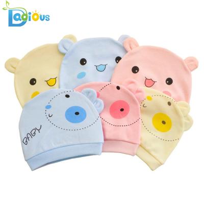 China COMMON 100% cotton baby hats and print baby winter hat custom hats warm baby hat for sale