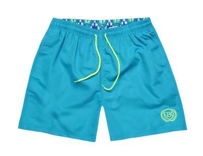 China Los pantalones cortos de los hombres del polo para la playa sólida del poliéster corto para hombre del traje de baño de la marca de los hombres ponen en cortocircuito pantalones cortos casuales que hacen compras del descenso en venta