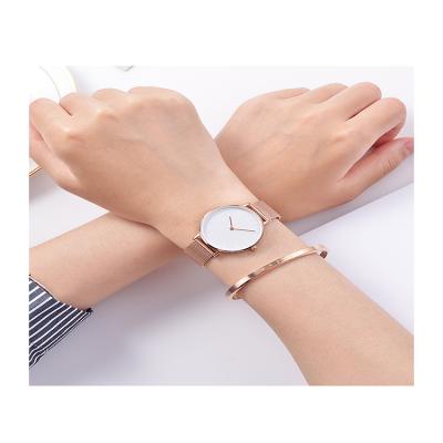 China Perfect Japan Movement Day/Date Wrist Watch Quartz Watch Stainless Gold and Silver Ladies Fashion Watches for sale