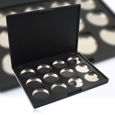 China Waterproof Empty Round Empty Eyeshadow Palette DIY Eyeshadow Custom Makeup Palette for sale