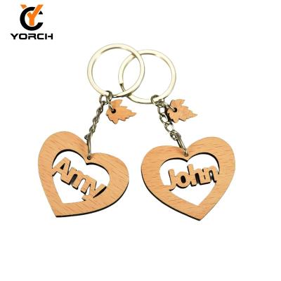 China Promotion Custom Lovers Wooden Laser Logo Engraving Wood Keychain Wood Keychains For Lovers for sale