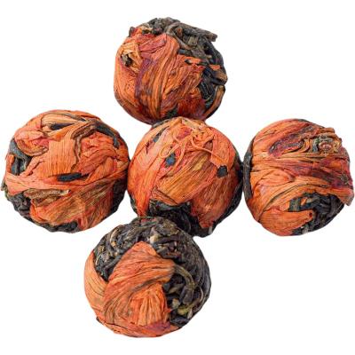 China Wholesale Premium Loose Tea Natural Foods Dried Lily Flowering Pu'erh Dragon Pearl Balls Dry Flower Tea 8G for sale