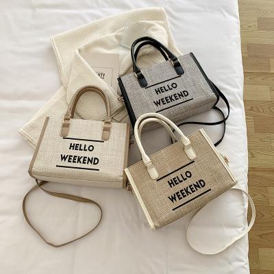 China WEEKEND Empty Print HELLO Leisure Heart Straps Woman Fabric Cross Replaceable Body Bags for sale