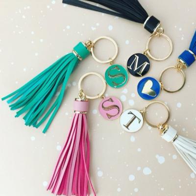 China Personalized Plastic Leather Tassel Key Chain Decorated With Enamel Monogram Long for sale