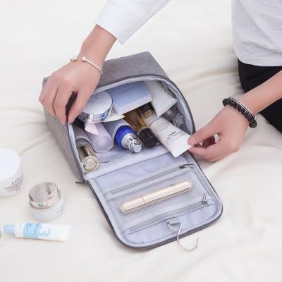 China Normcore/Danrosen Minimalist Travel Cosmetic Bag Hanging Portable Bag Makeup Thickened Waterproof Wash Handheld Bag for sale