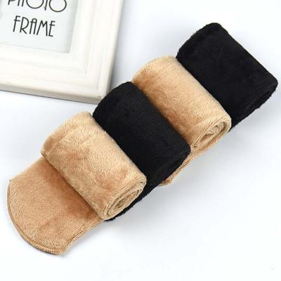 China The 2021 elastic design sports thick socks wholesale plus velvet sports snow bumps skin color hot women's boots socks for sale