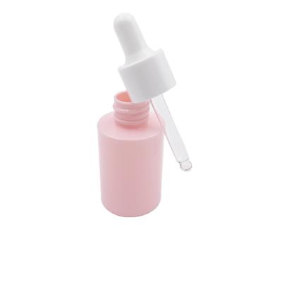 China High Quality Plastic 30ml Pink Color Essential Oil Dropper Bottles Customize 30ml Frosted Serum Bottle for sale