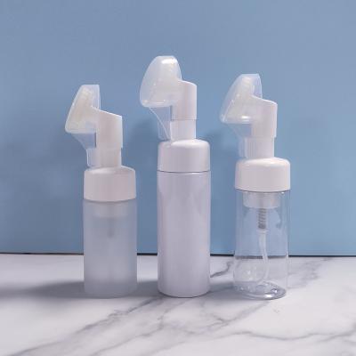 China 30ml Cosmetic Plastic White Foaming Soap Dispenser Pump 10oz Foaming Bottle With Silicone Brush for sale