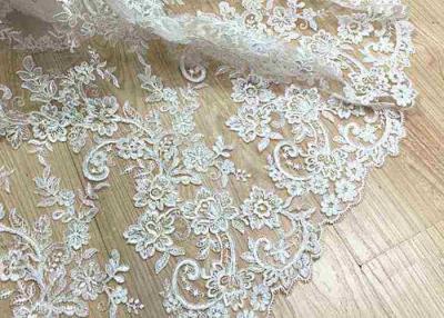 Cina Tessuto legato con corde del pizzo dell'avorio delicato, tessuto di Tulle ricamato bianco floreale per il vestito da sposa in vendita