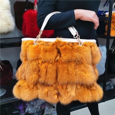 China Normcore/latest factory direct wholesale fox fur handbag leopard print fur bag ladies minimalist handbags for sale