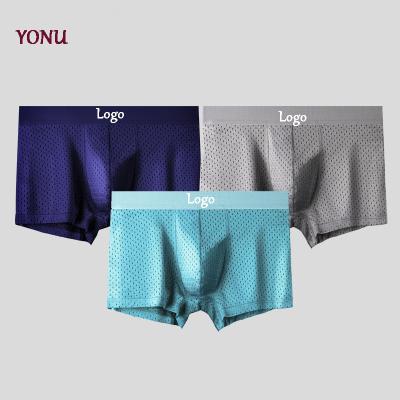 China Solid Color Men's Mesh Male Sexy Underwear Quick Breathable Hot Ice Silk Boxer Briefs Breathable Dry Briefs for sale