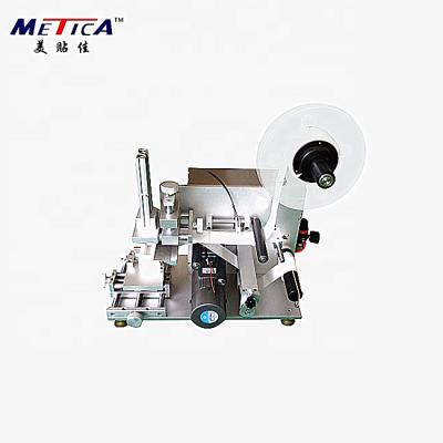 China Food easy to use low price manual table top labeling machine for flat bottle for sale