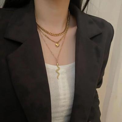 China High Quality Fashion Stainless Steel Cuban Chain And Diamond Heart Snake Pendant Multi Layers Necklace For Women for sale