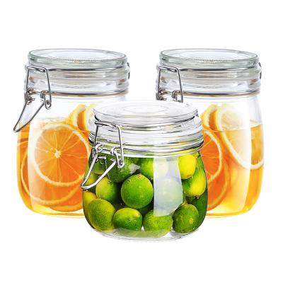 China Wholesales Factory Price 500ml Viable Kitchen Utensils Glass Jar With Metal Clip Cylinder Glass Jar for sale