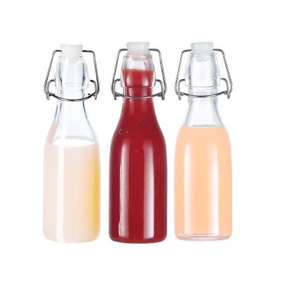 China Wholesale New 1000ml Freshness Preservation Manufacturer Beverage Bottle Glass Luxury Glass Bottles for sale