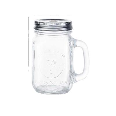 China Food Vending 17oz Embossed Logo 500ml Wide Mouth Glass Mason Jar With Handle And Straw for sale