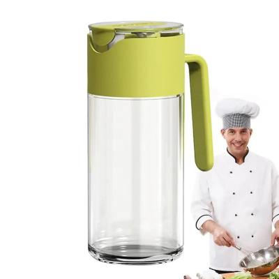 China Gravity Automatically Open Close Oil Dispenser Bottle Leakproof 550ml With Pourer for sale