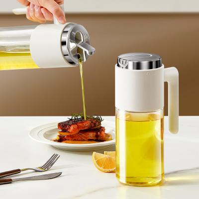 China NEW 500 Ml/17oz Stainless Steel Lid Clear Vinegar And Olive Oil Bottle Dispenser Auto Flip Glass Oil Pot Container for sale