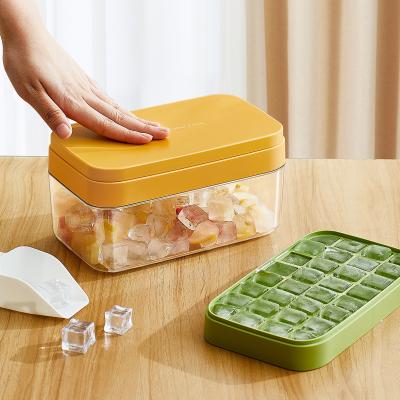 China Easy Release Stackble Spill-Resistant Ice Cube Tray with Lid and Bin for Freezer for Whiskey Cocktail, Tea, Coffee for sale