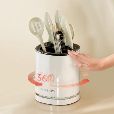 China 360 Rotating Kitchenware Storage Box Multi-functional Rotating Knife Holder Chopstick Barrel Knife Storage Rack Humanized Design for sale